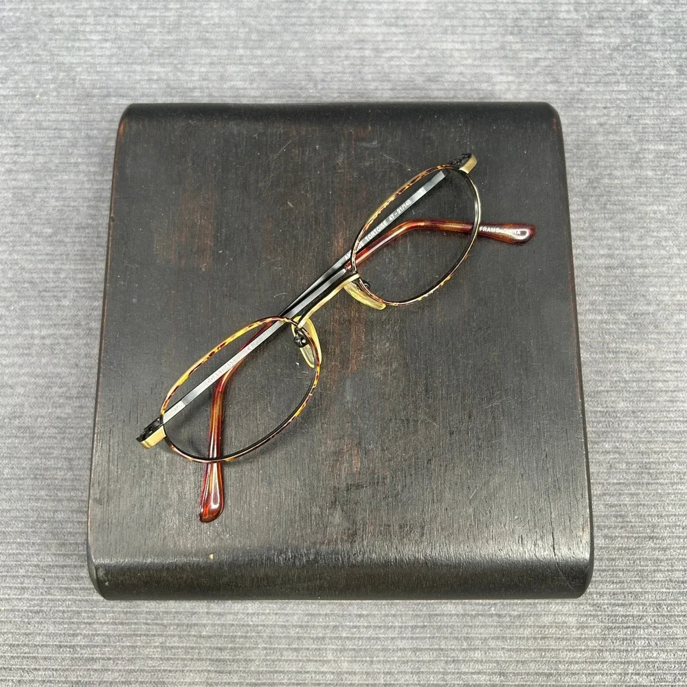 Coast 453 Antique Tortoise Oval Y2k Eyeglasses Frames 47-21-140 Black Gold Metal